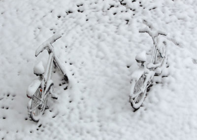 Snow covered bicycles are seen in Germering